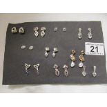 10 pairs of silver & stone set earrings