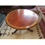 Circular mahogany pedestal coffee table