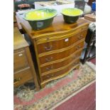 Yew serpentine fronted chest of 4 drawers with slide