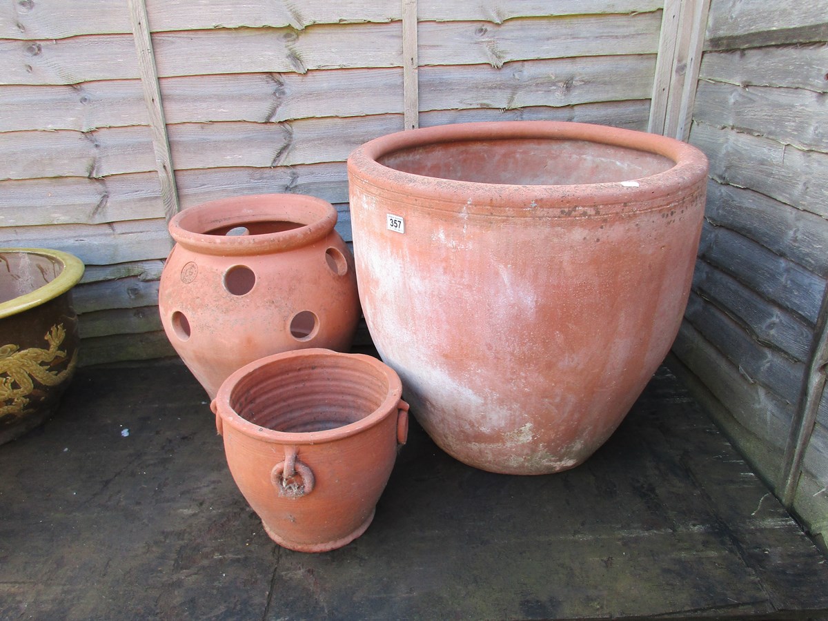 3 terracotta planters