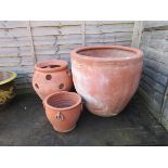 3 terracotta planters