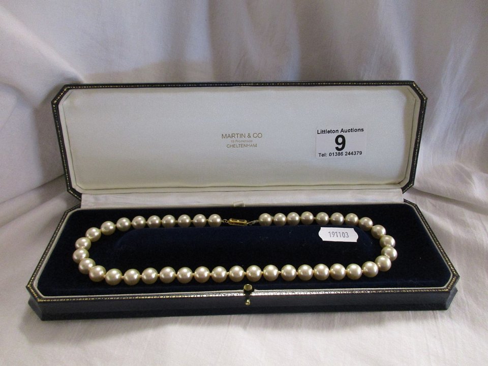 String of individually knotted pearls by Martin & Co