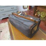 Leather Gladstone bag with interesting labels