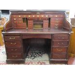 Large twin-pedestalled roll top desk with numerous drawers