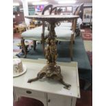 19C Tripod table with gilt cherub base