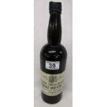 Early 3 part moulded bottle of Port from Jennings Brothers of Cockermouth (Unopened)