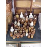 Collection of small stoneware jars & bottles