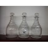 Three teardrop decanters