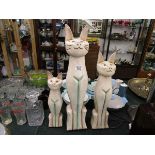 3 cat figures