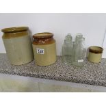 Collection of old bottles & stone jars