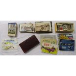 Tin of cigarette card albums, old postcards & maps