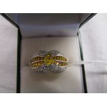 Fine platinum, diamond & yellow sapphire ring