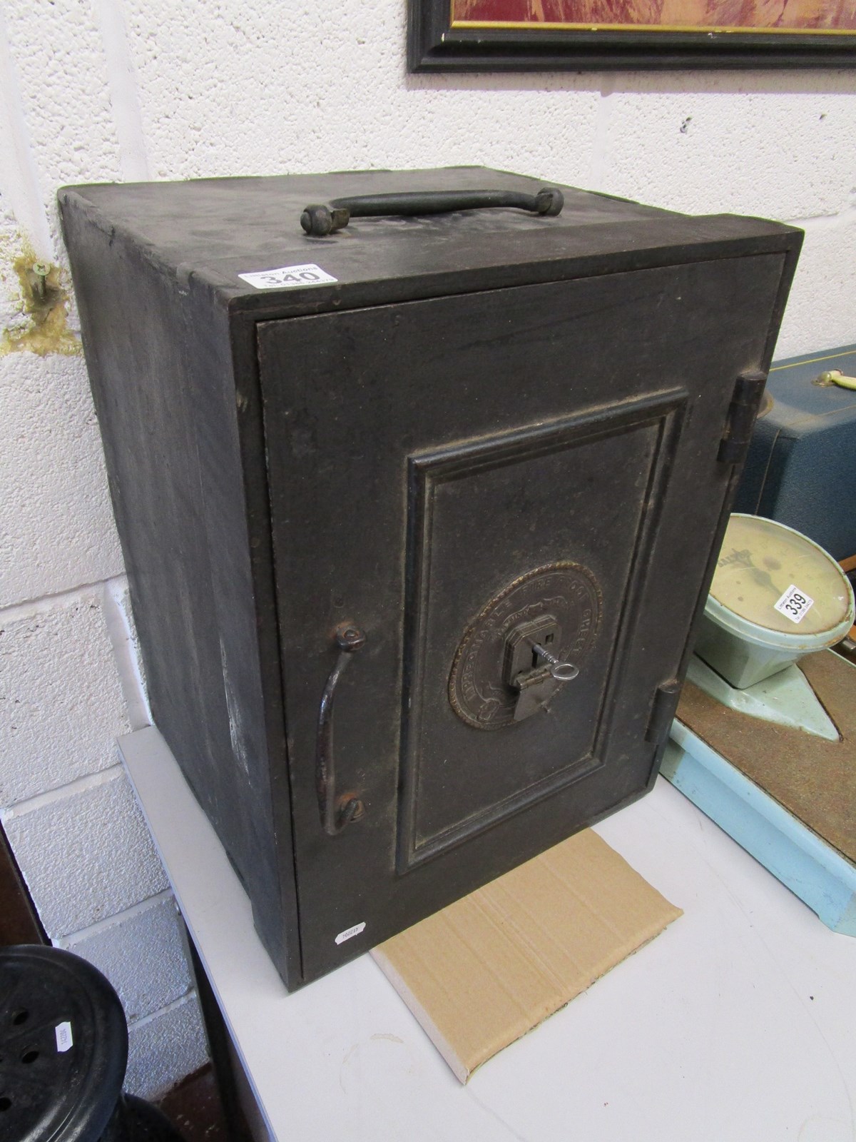 Antique metal safe with key