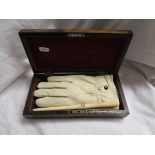 Coromandel box containing vintage gloves & ivory glove stretcher