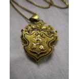 Gold mourning pendant on chain, approx 13.7g