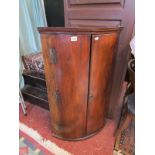 Georgian mahogany bowfront corner cabinet