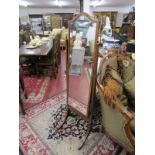 Mahogany inlaid cheval mirror with brass finials