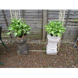 Pair of chimney stacks with plants