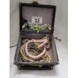 Small box of costume jewellery