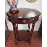 Small mahogany occasional table with lower tier