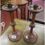 Pair of oak Arts & Crafts wooden candle sticks