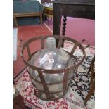 Carboy in metal container