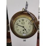 Oak cased circular ship-type wall clock