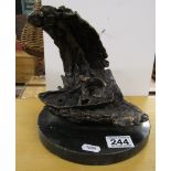 Bronze sculpture of boat on wave on marble base (Mast missing)