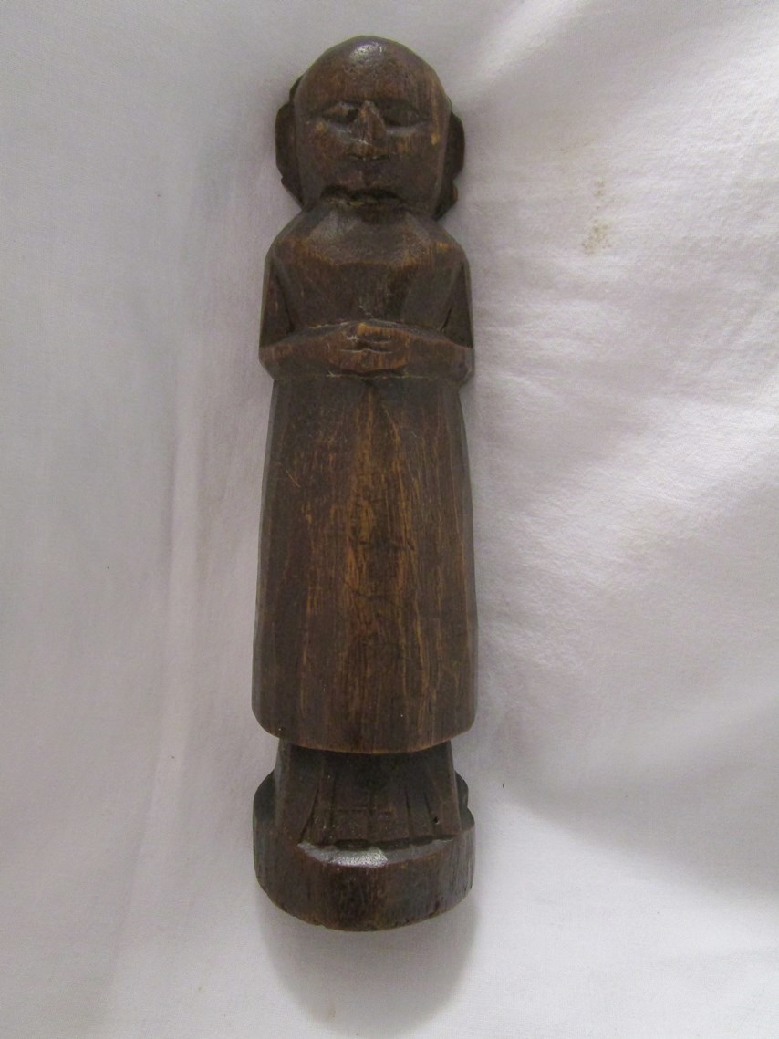 Early carved figure of lady