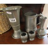 Collection of pewter to include an early English quart tankard