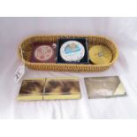 Basket of vintage compacts etc