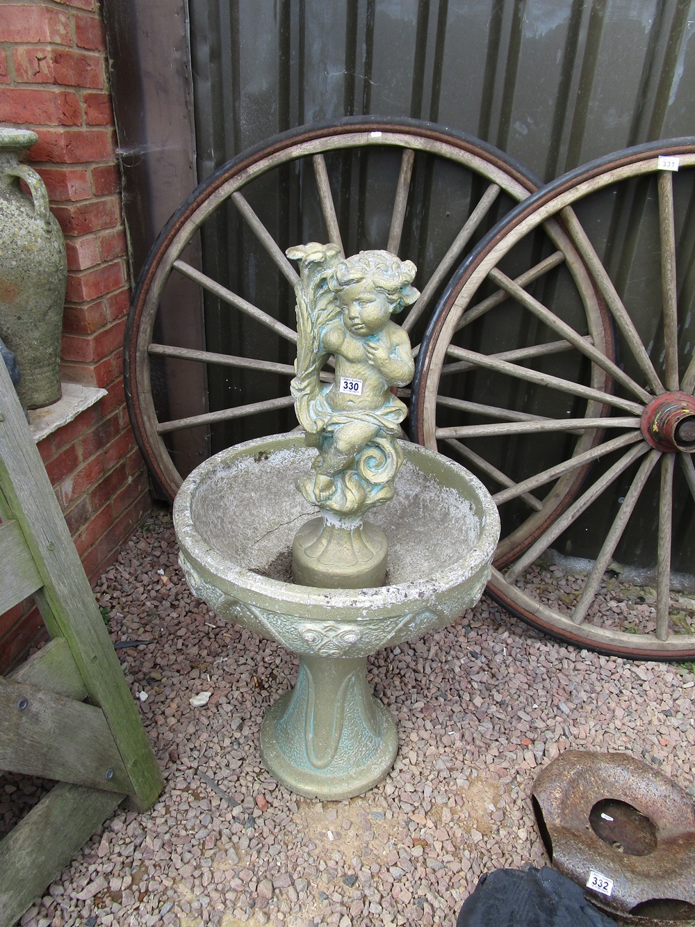 Stone cherub fountain