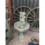 Stone cherub fountain