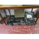 3 power tools in cases