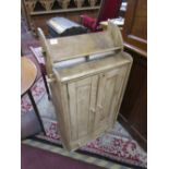 Small pine cupboard with integrated book rest