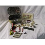 Tin of military badges etc