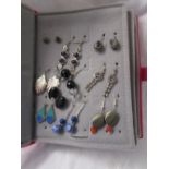 Folder of earrings