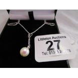 18ct, platinum and pearl pendant on silver chain