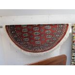 Circular hand woven patterned rug