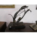 Contemporary bronze sculpture on marble base