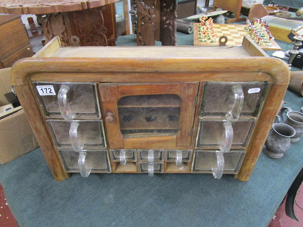 Unusual apothecary cabinet with glass drawers