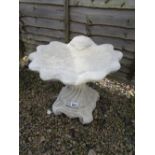 Stone shell bird bath