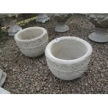 Pair of circular stone planters