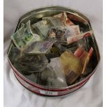 Tin of coins & bank notes