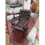 Leather & mahogany button-back rocking chair