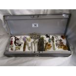 Vintage costume jewellery in a lockable metal toolbox