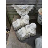 Stone pair of cherubs and cherub wall pocket