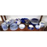 Shelf of china to include Willow pattern