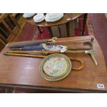 Collection of parasols, walking sticks & an oval embroidery