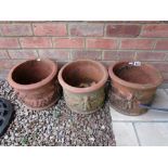 3 terracotta pots